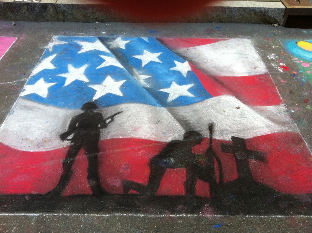 chalk drawing of American soldiers and flag